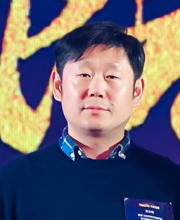 贺志明